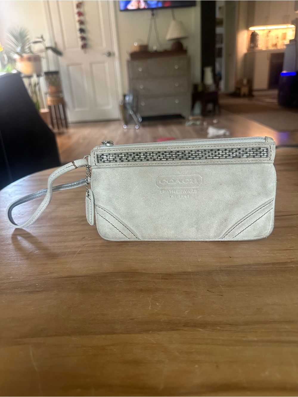 Coach Suede beaded Wristlet in winter white used, light wear inside clean